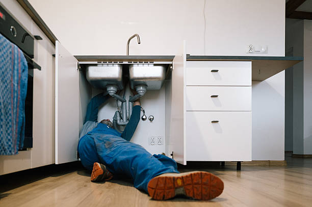 Professional Drain Cleaning technician working in Central Falls, RI